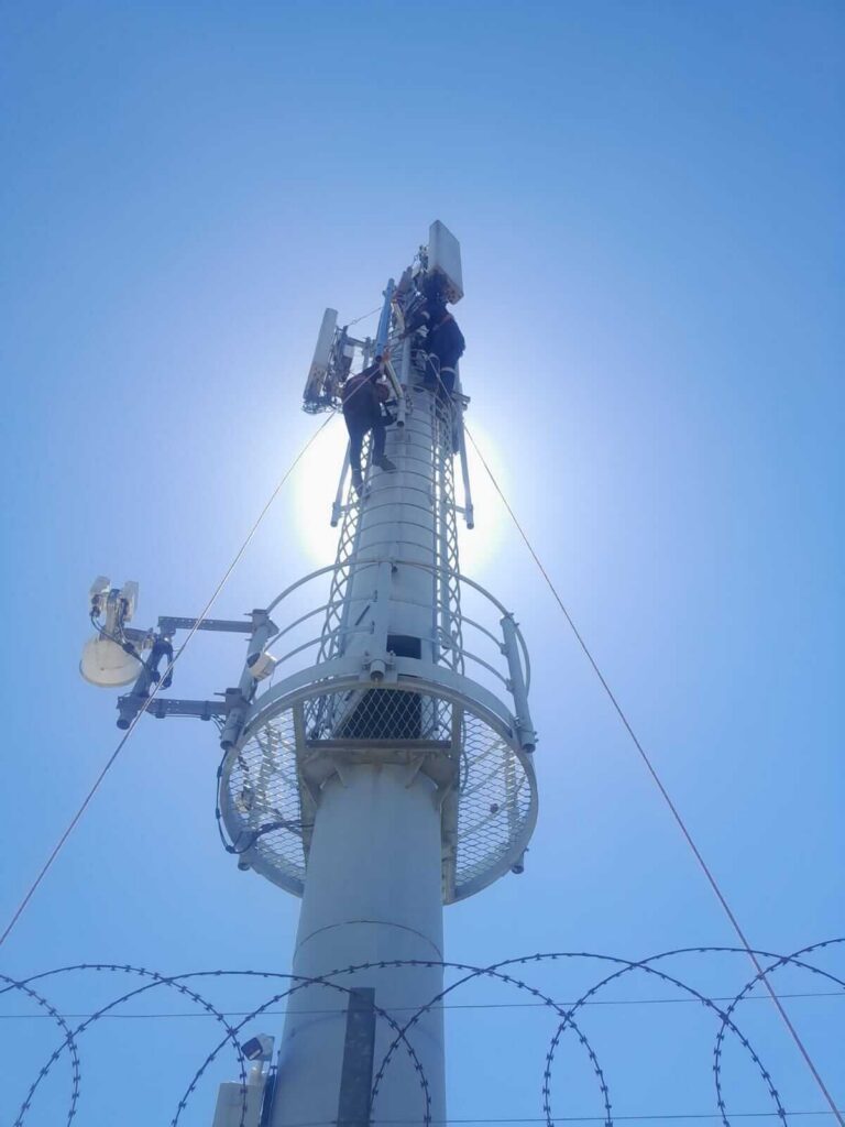 Telecommunications Tower Viewed From Below Against Clear Blue Sky. (1)